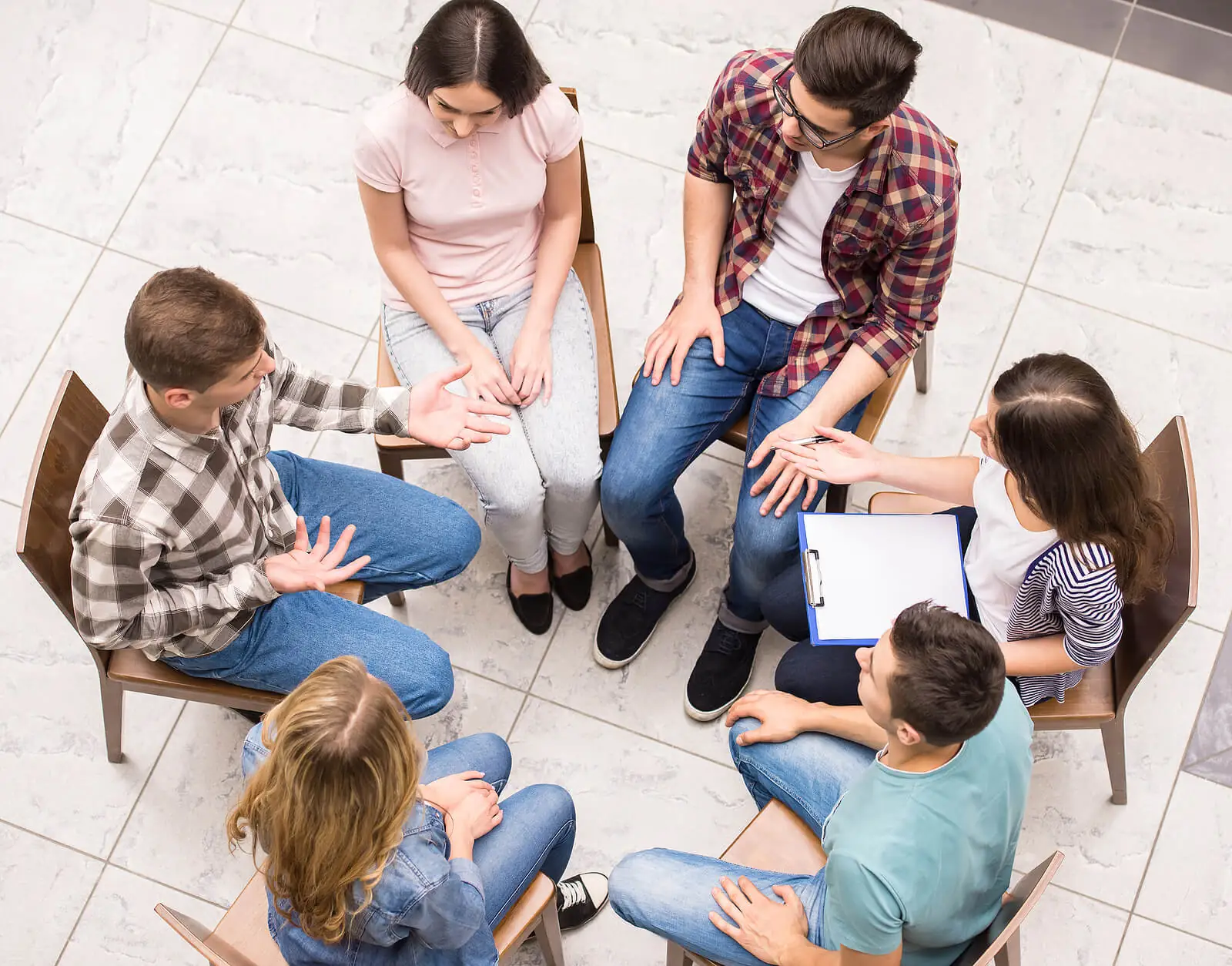 group therapy | adult iop in houston, tx | adult intensive outpatient program in houston, tx | iop for depression | adult outpatient program | 77008 | 77009 | 77018 Image of a group of men and women sitting in a circle representing group therapy. With the support of a adult IOP in Houston, TX you can begin to cope and heal from the depression symptoms you struggle with.