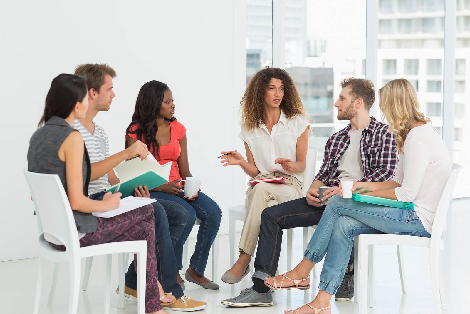 group therapy | adult iop in houston, tx | adult intensive outpatient program in houston, tx | intensive outpatient program houston | adult outpatient program | 77007 | 77055 | 77057 Image of a group of people sitting in a circle in group therapy. In an adult intensive outpatient program in Houston, TX you can learn DBT skills to help you with impulse control and decision-making.