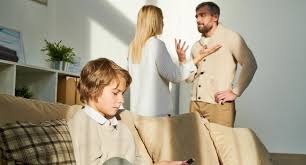 Parents fighting and child listening to parents fighting